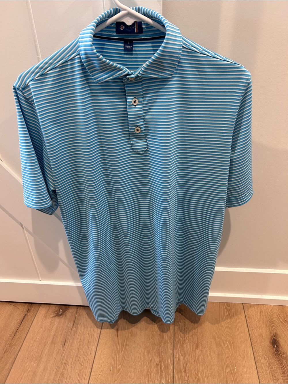 Stitch Golf Light Blue Striped Performance Polo Shirt